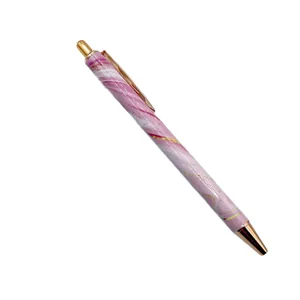 Pink marble pattern metal ballpoint pen with elegant rose gold accents for writing