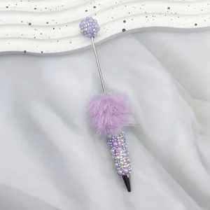 Creative purple rhinestone ballpoint pen with soft pom-pom and pearl details