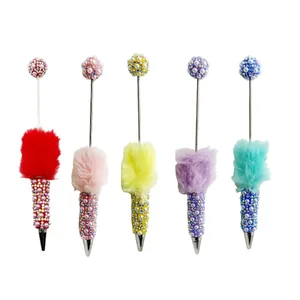 Handmade colorful pearl and rhinestone ballpoint pens with decorative fur pompoms