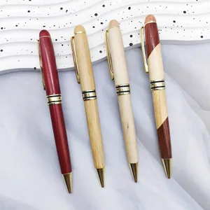 Premium bamboo and rosewood business ballpoint pens set with elegant gold metal accents