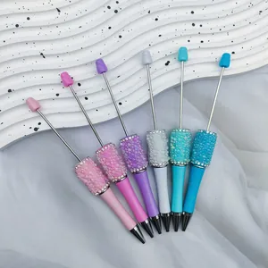 Set of six DIY mermaid bead pens with iridescent crystals and rhinestone details