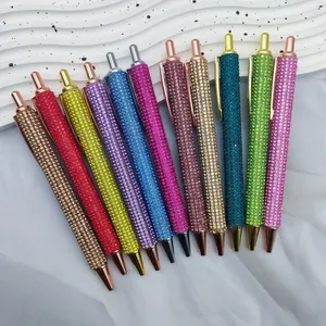 Set of 12 colorful sparkling rhinestone click ballpoint pens for office and gift.