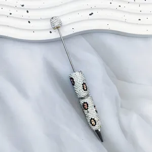 Luxurious leopard print rhinestone ballpoint pen with sparkling handcrafted crystal beads