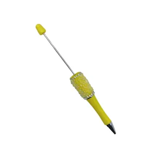 Elegant yellow DIY beadable ballpoint pen featuring sparkling mermaid bead decorations