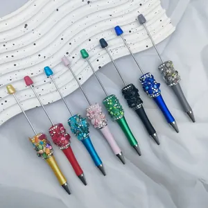 Colorful DIY beadable ballpoint pens decorated with shimmering rhinestones and stones