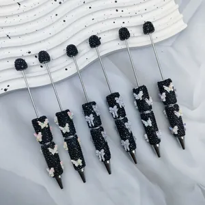 Handmade beadable pens with black rhinestones and white butterfly charms