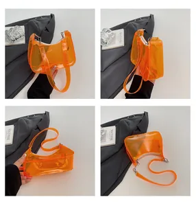 Detailopnamen vanuit meerdere hoeken van een trendy oranje transparante schoudertas