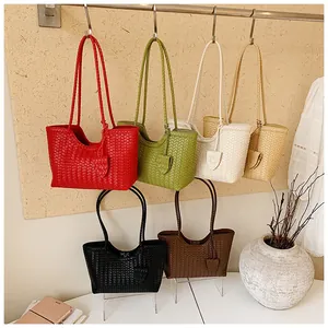Collection of six woven texture tote bags in vibrant colors for stylish daily use