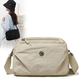 Mini bolso bandolera ligero de nailon para mujer con dos compartimentos con cremallera