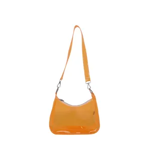 Trendy transparante oranje onderarm schoudertas voor dames met een zomerse uitstraling