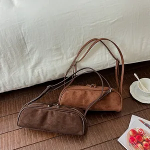 Retro suede bowling baguette shoulder bag for women in dark brown and tan colors