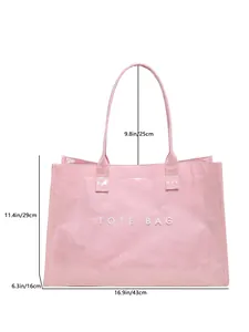 Vista detallada del bolso tote rosa brillante con dimensiones para tallas precisas.