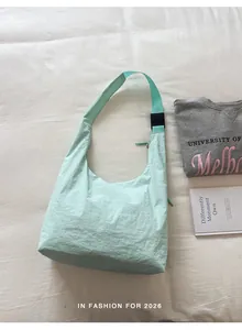 Casual mint green hobo shoulder bag with unique textured crinkled fabric for women