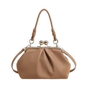 Elegant pleated cloud handbag with vintage gold-tone kiss-lock closure in khaki leather finish