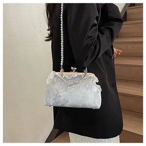Bolso de mano vintage estilo chino con cadena de perlas y encaje