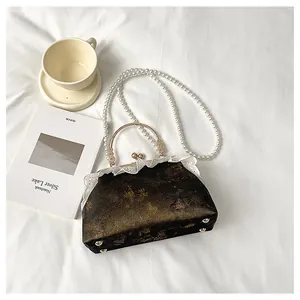 Bolso de mano vintage de estilo chino con correa de perlas y detalle de encaje blanco