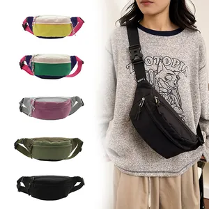 Trendy black lightweight crossbody fanny pack on model with colorful waist bag variants