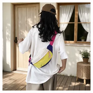 Back view of woman wearing a colorful dopamine-style lightweight crossbody chest bag.