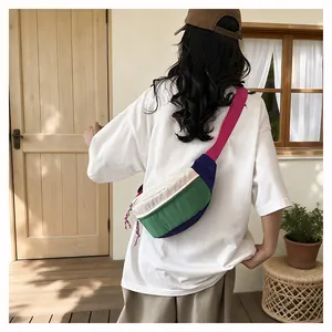Back view of a colorful dopamine style crossbody chest bag for women worn by a model