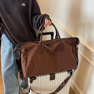 Stylish leopard print travel duffel bag with large capacity and adjustable shoulder strap