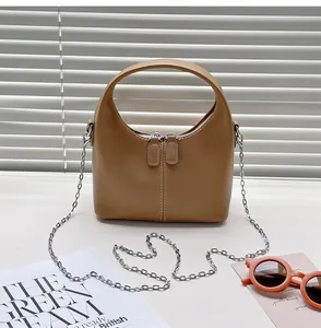Minimalist khaki soft PU handbag featuring silver chain strap and top handle design