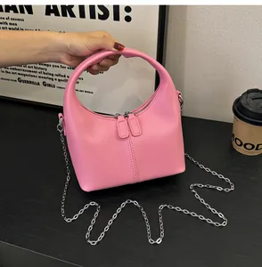 Chic pink soft PU leather hobo handbag with silver chain strap shown in detail