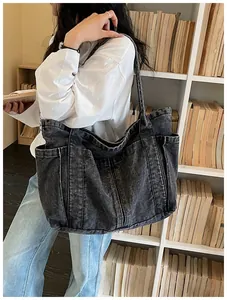Bolso tote grande de mezclilla negra con bolsillos externos para estudio y ocio