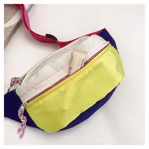 Interior detail of colorful dopamine-style crossbody chest bag with grid pattern