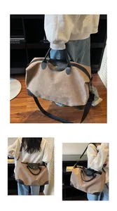 Large high-quality frosted suede travel bag with black handles and detachable shoulder strap