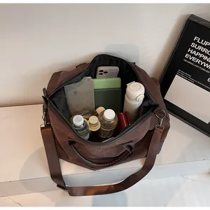 Large capacity retro travel bag interior view showing space for daily essentials