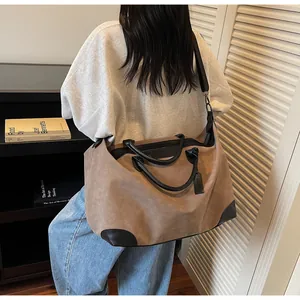 Stylish large capacity suede travel tote bag with black handles and shoulder strap