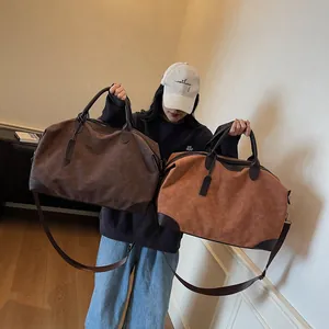 Large capacity travel duffle bag for women, stylish crossbody tote in brown tones