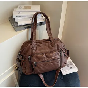 Vintage brown PU leather tote bag with multi-pocket design and adjustable shoulder strap
