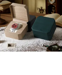 Detailed view of luxury octagonal watch boxes in vintage setting with an open case