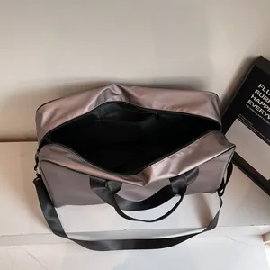 Large capacity square travel duffle bag for women with shoulder strap