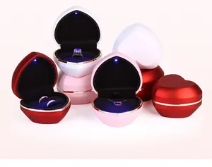 Elegant heart-shaped jewelry boxes with LED lights for proposal rings and necklaces
