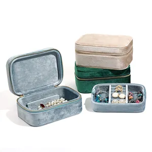 Premium portable velvet jewelry travel case with zipper closure and multiple storage compartments
