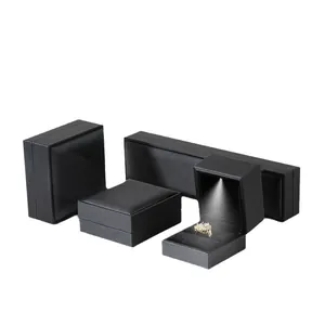 Luxury black jewelry box collection featuring LED spotlight for rings and pendants