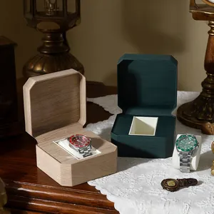 Elegant vintage octagonal watch display box with wood grain texture and soft inner cushion