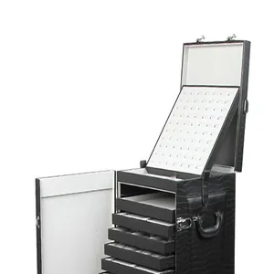 Grand coffret de rangement bijoux multicouche noir texture crocodile avec tiroirs et fentes.