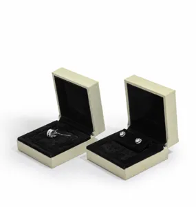 Detailed macro view of premium suede jewelry storage boxes with soft velvet lining