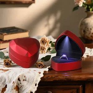 Red heart-shaped jewelry box with LED light for engagement rings