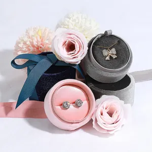 Elegant cylindrical velvet jewelry box set for rings and necklaces with floral decor