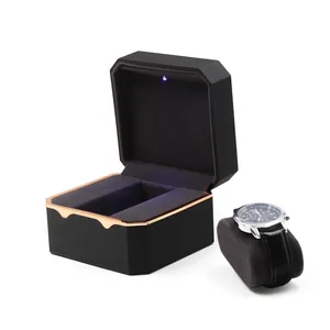Octagonal black watch box with LED light and rose gold trim for luxury gift display