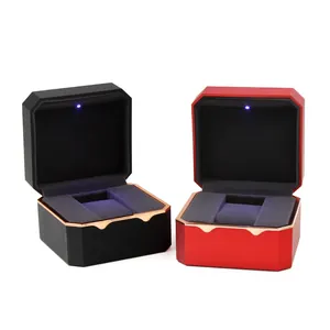 Luxury octagon watch storage boxes in black and red with internal LED light and gold trim