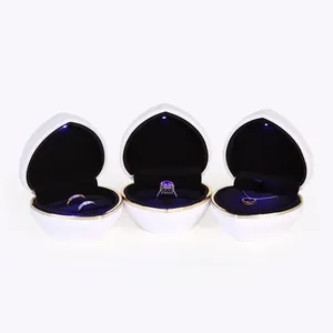 Heart-shaped white LED jewelry boxes set for engagement rings and pendant necklaces