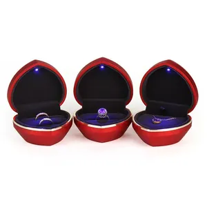 Elegant red heart-shaped jewelry gift box with LED light for ring and necklace display