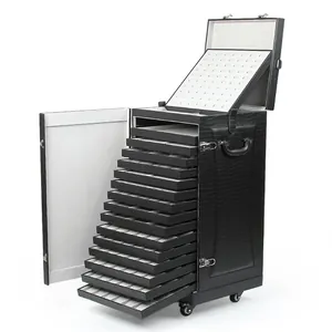 Valise de rangement professionnelle pour bijoux avec tiroirs multiples et roulettes.