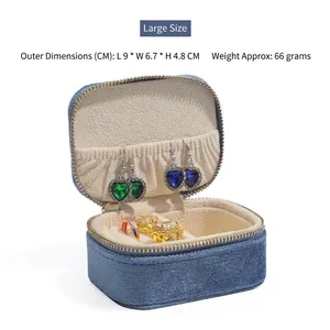 Blue velvet portable jewelry storage box with dimensions 9x6.7x4.8cm and internal display