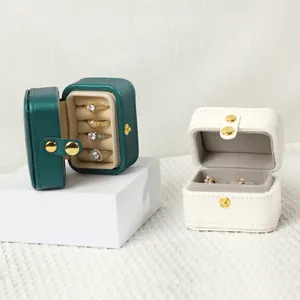 Elegant portable PU leather jewelry box with snap button for rings and earrings organizer